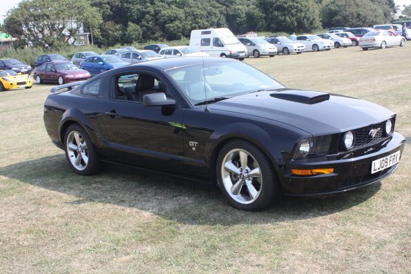 Gosporteers Motor Show Car Rally Stokes Bay Gosport Hants Mustang and view across site 26th August 2013 by Thomas Newton